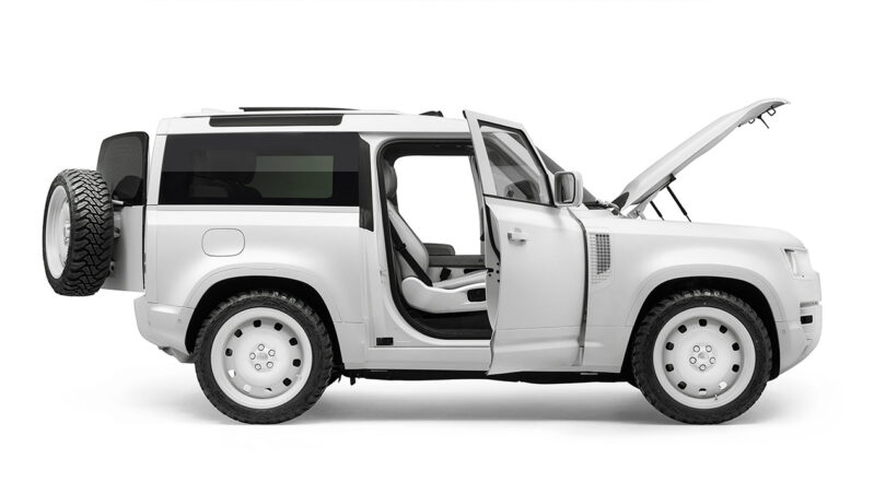 Side view of the metal lacquer coated Firmship Land Rover Defender with both passenger doors, rear door, and hood open