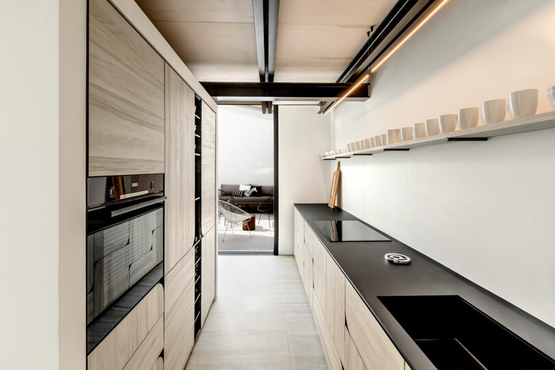 long view through modern galley kitchen