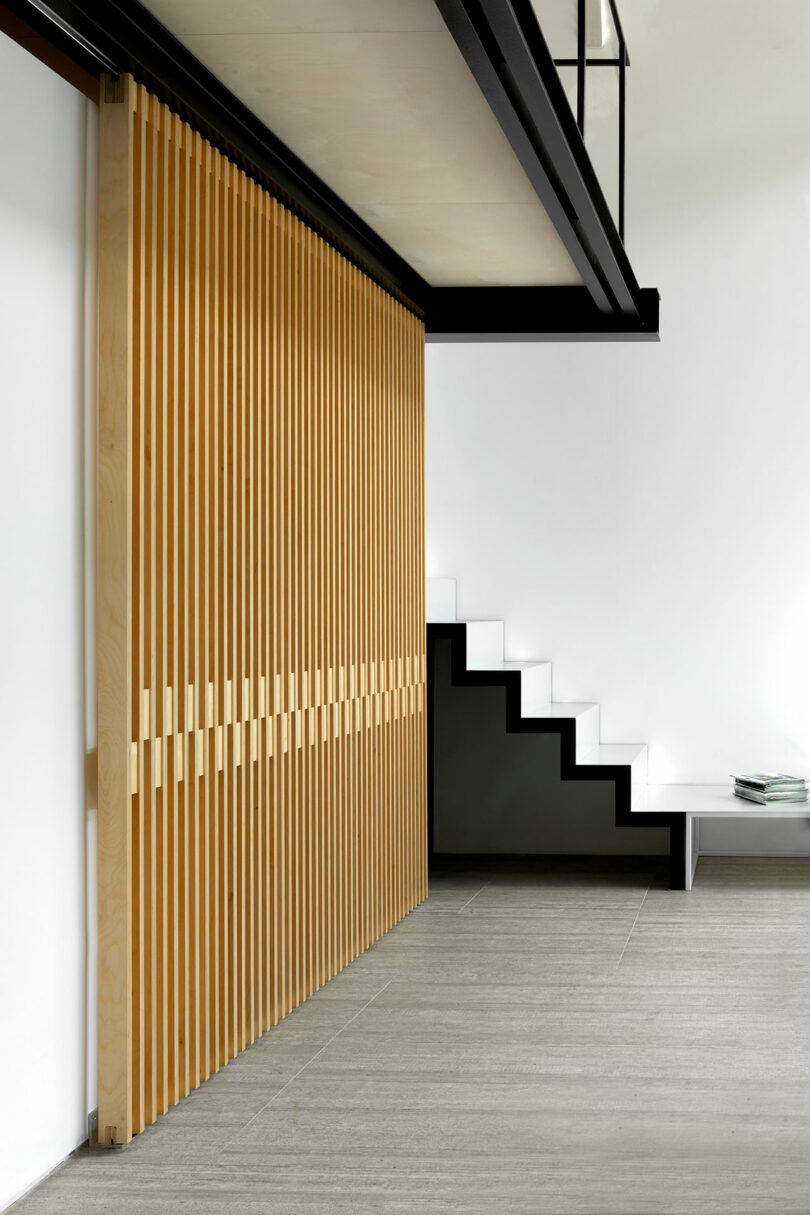 partial view in modern apartment looking towards modern staircase