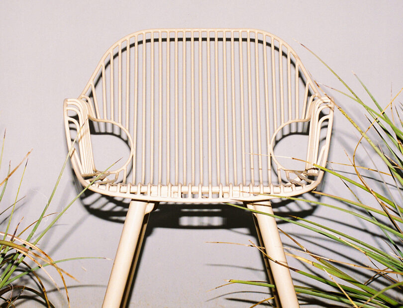 white wire frame outdoor armchair