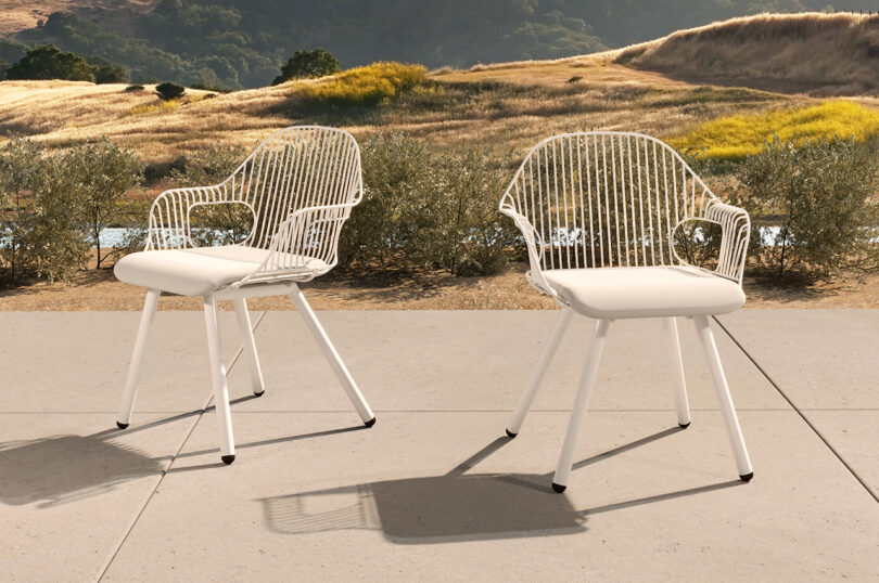 white wire frame outdoor armchairs
