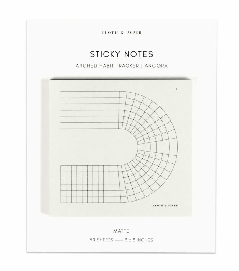 flat view of a minimalist habit tracker sticky note in packaging