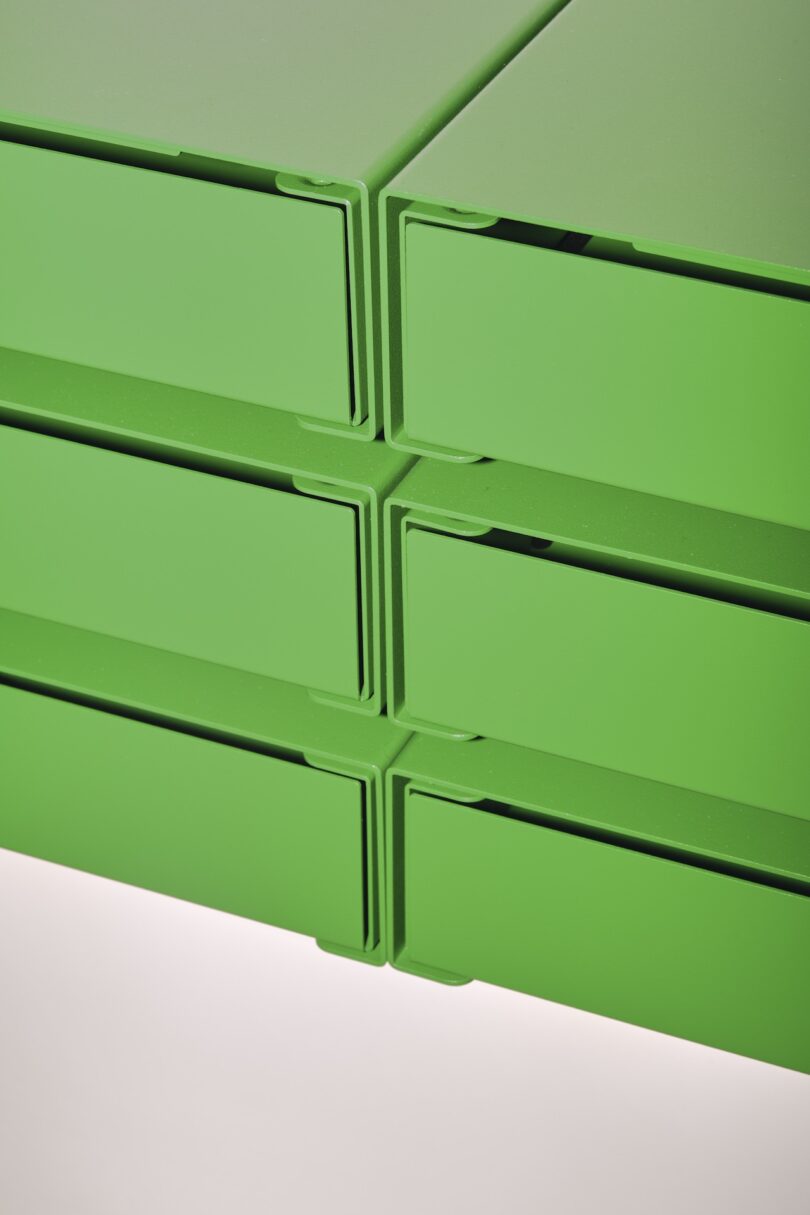 details of green wall mounted drawers