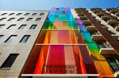 A Vibrant Tokyo Building With a Vertical Rainbow Facade