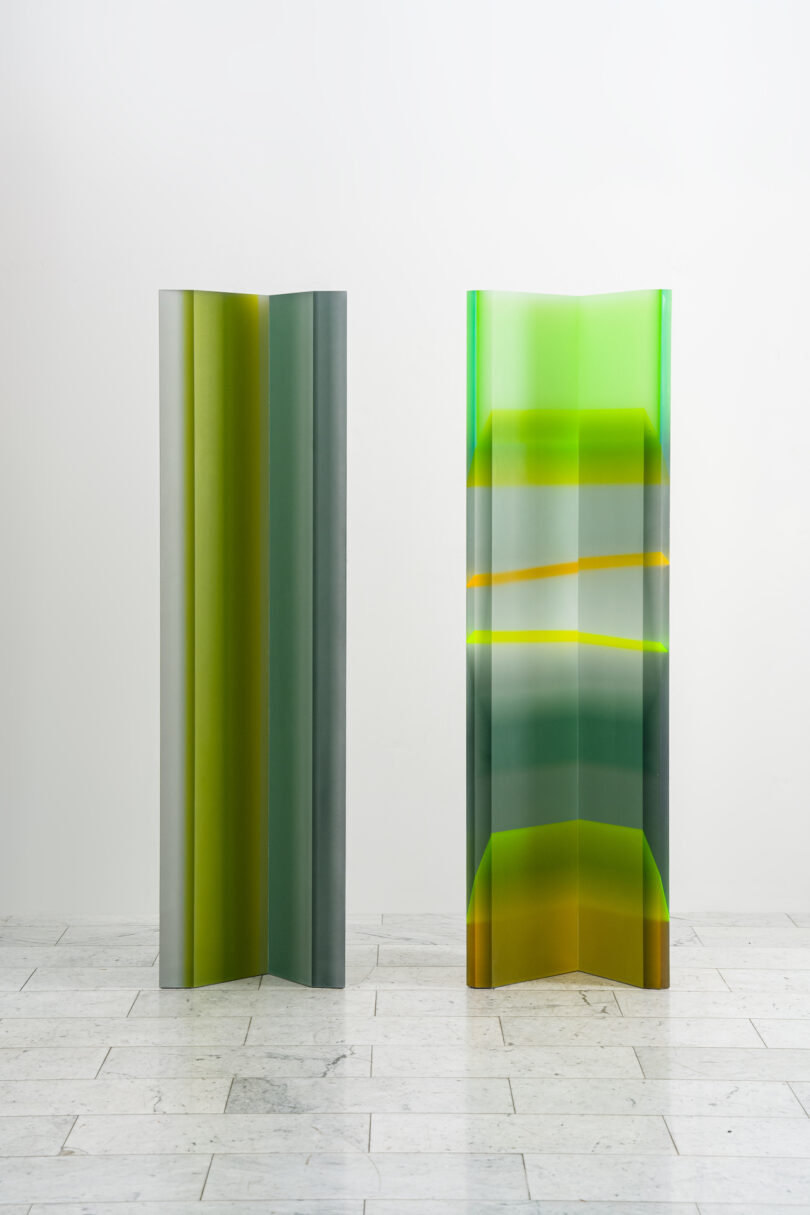 two tall, colorful lucite totems