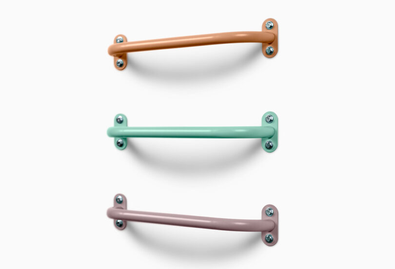 Three powder coated Randle Wall Climbing Handles in small vertical ladder configuration.
