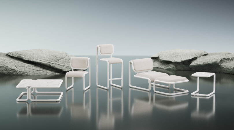 collection of white metal and upholstered furniture next to two rocks