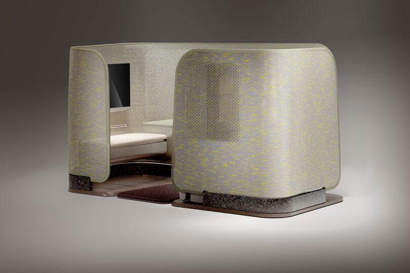 Modern private airline seat cabin featuring a curved acoustic and privacy panels made with 3D knit wool in green and yellow textiles.