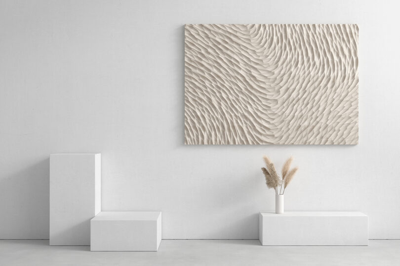 white room with a textured panel on the wall