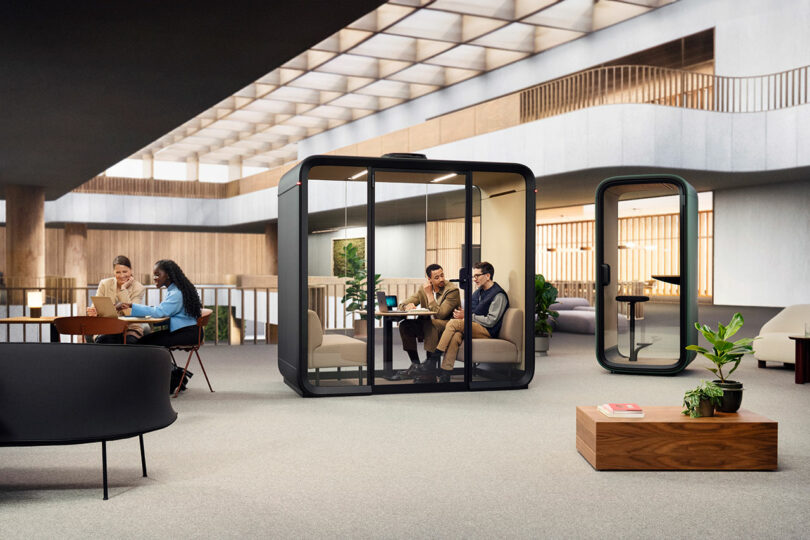 A four-person privacy pod in an office space.