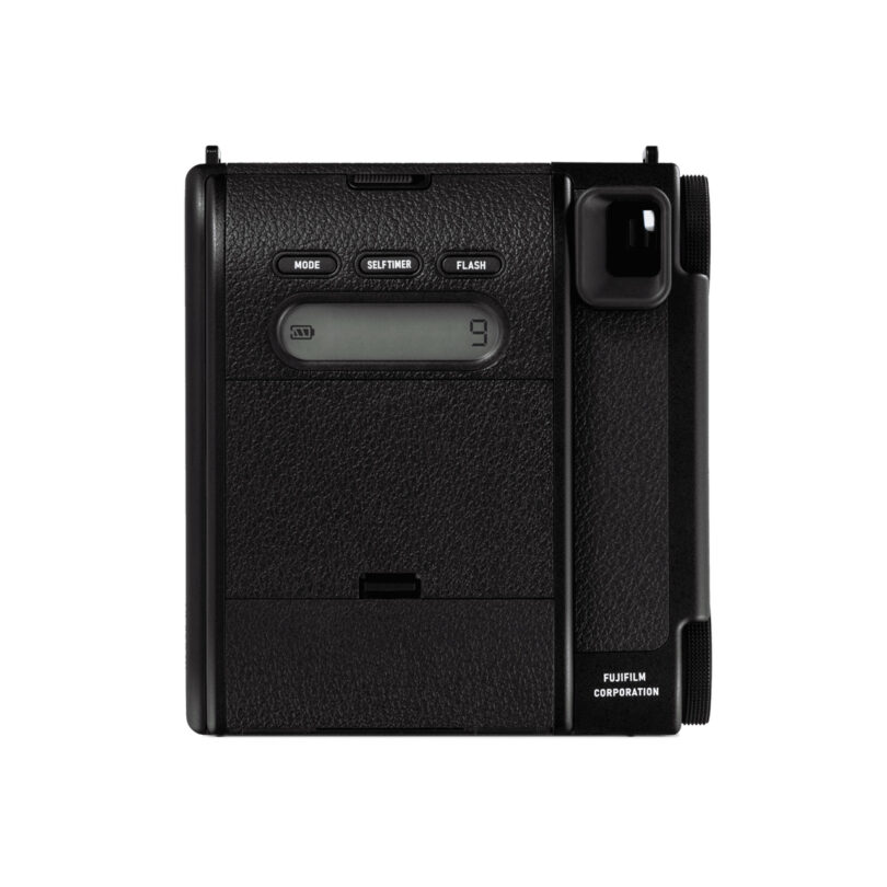 Compact Fujifilm Instax Mini 99 instant film camera with a black finish and buttons for mode, self-timer, and flash settings.