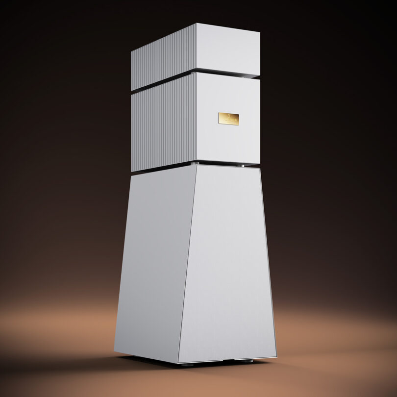 Modern white tower-style pc case with Goldmund Theia wireless speakers on a gradient background.