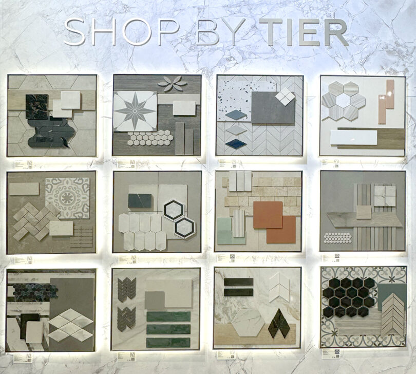 A wall display of 12 different tiles arrangements showing combinations of shapes and colors.