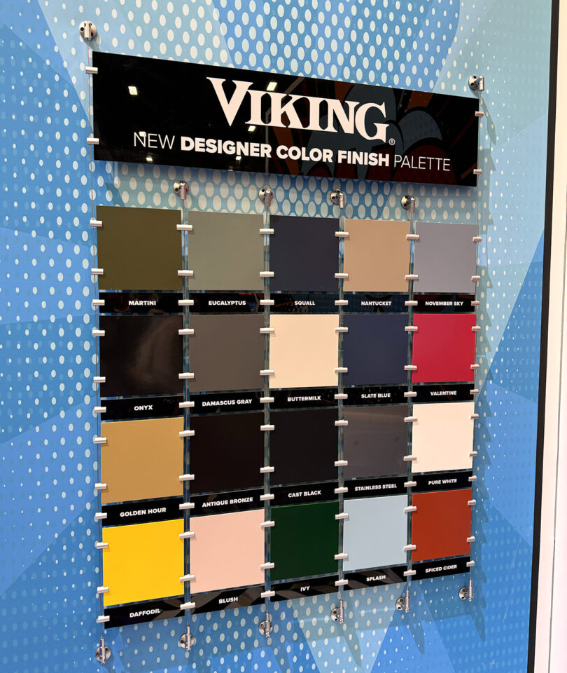 Viking's new color palette, showcased at KBIS, is displayed on a blue wall.