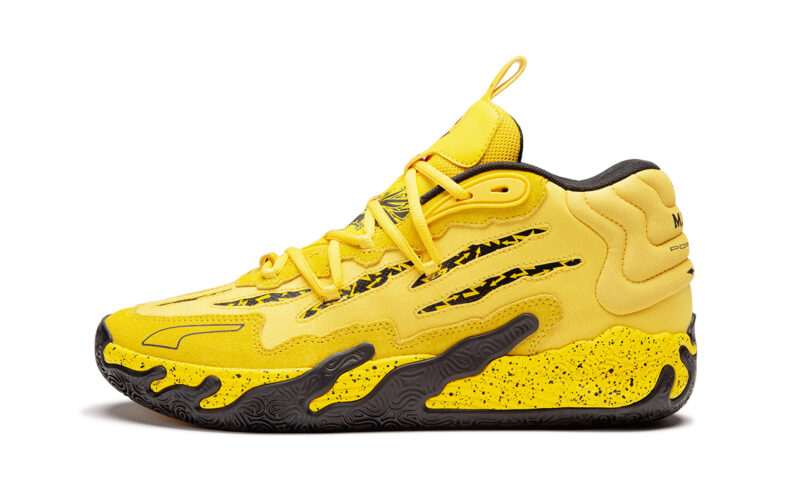 A yellow and black PUMA x Porsche Basketball Collection sneaker with a black sole.