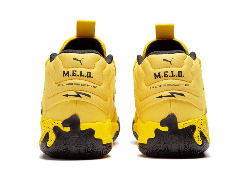 The PUMA x Porsche Basketball Collection sneakers with yellow and black detailing and "M.E.L.O." and "Porsche" printed across its heel.