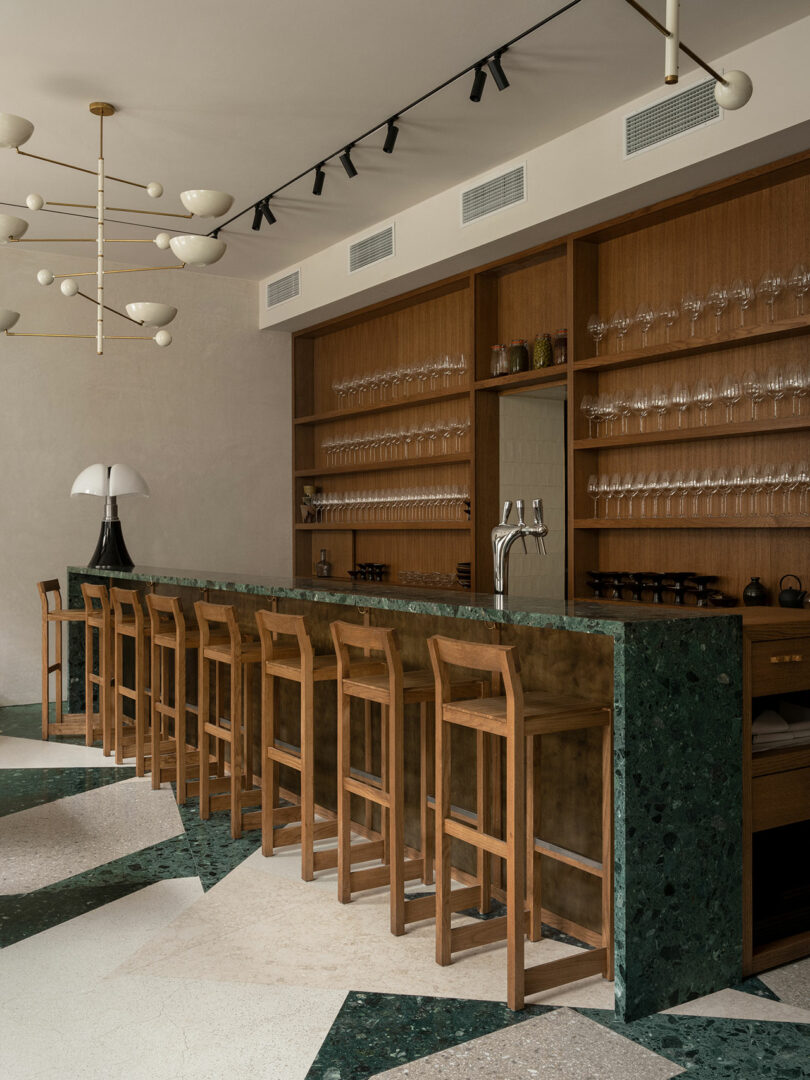 A long bar with stools.