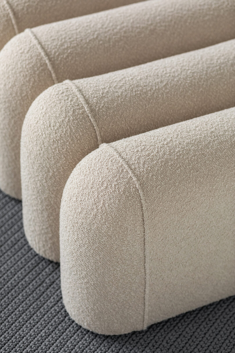 Modular modern seating with textured upholstery.