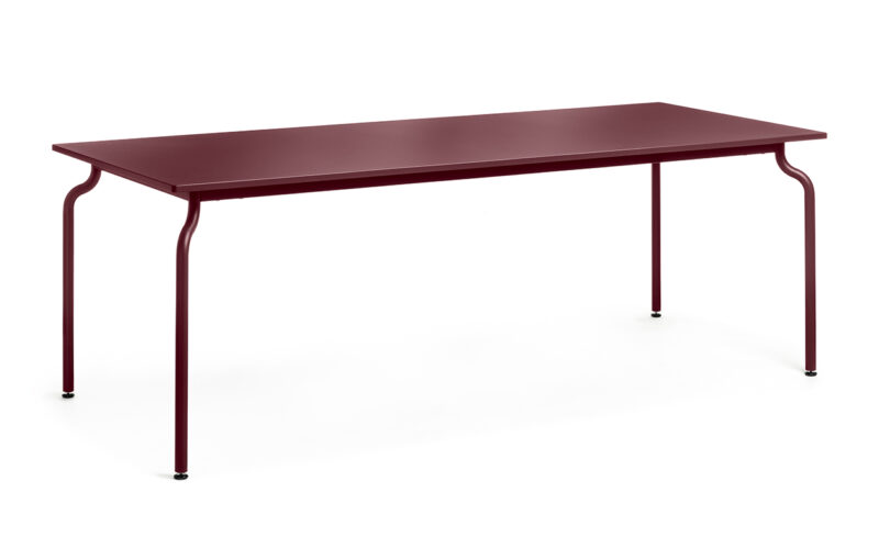 A burgundy-colored rectangular metal table with slender legs.