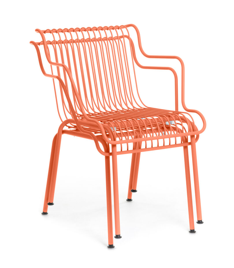 two stacked orange modern outdoor chairs on white background