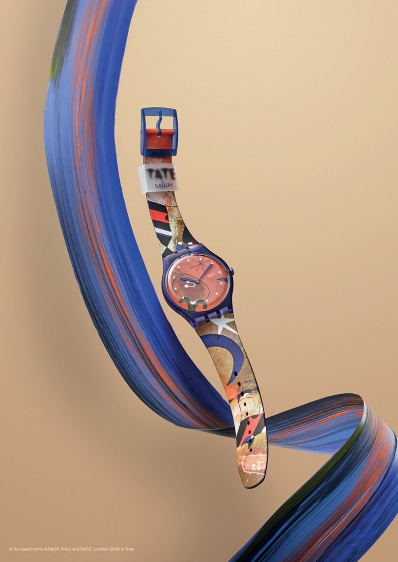 A colorful Swatch x Tate Gallery Watch Collection wristwatch with an artistic design suspended against a swirling abstract background.