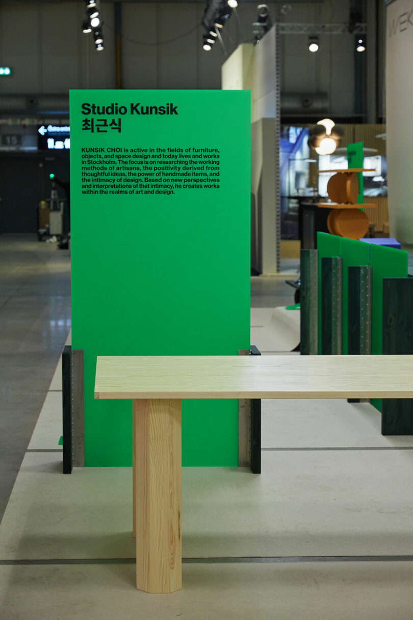 Two geometric table legs on display at an exhibition.