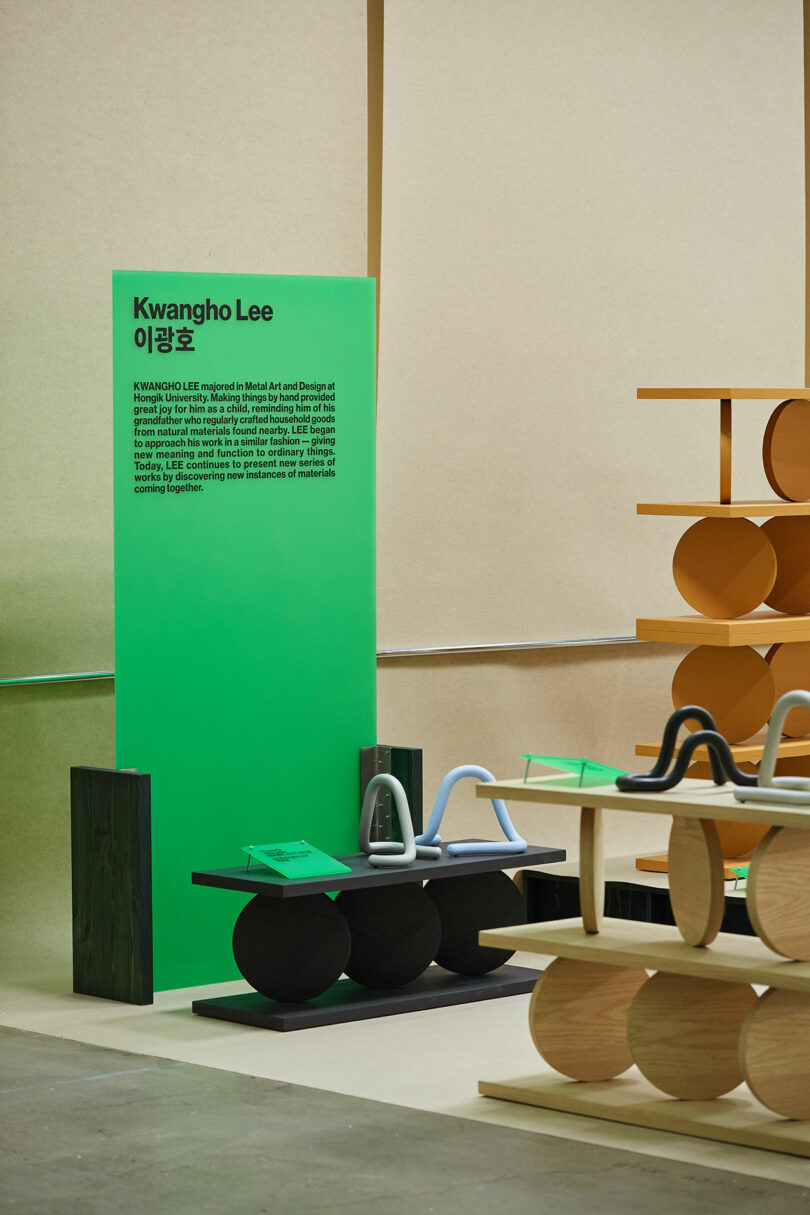 Geometric shelving with books and art objects on display.