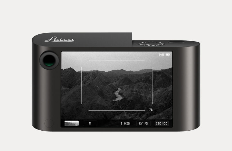 A Leica M Reimagined Concept camera with an image of mountains on its touchscreen display.