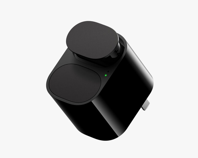Black Leica M Reimagined Concept digital camera's plug-in power accessory.