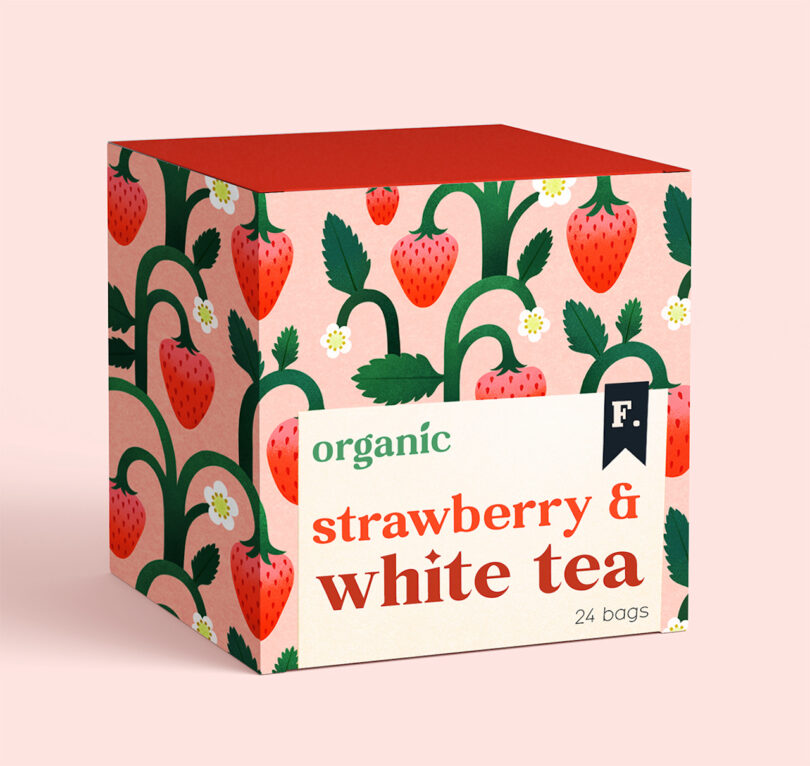 A box of organic strawberry and white tea with a strawberry-patterned design, containing 24 bags.