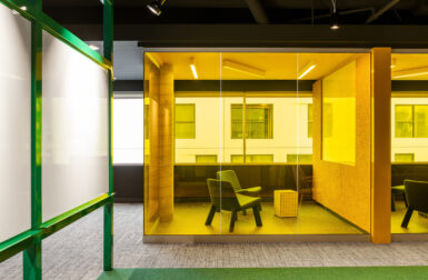 Color Blocking Defines This Gaming Office’s Long Floor Plan