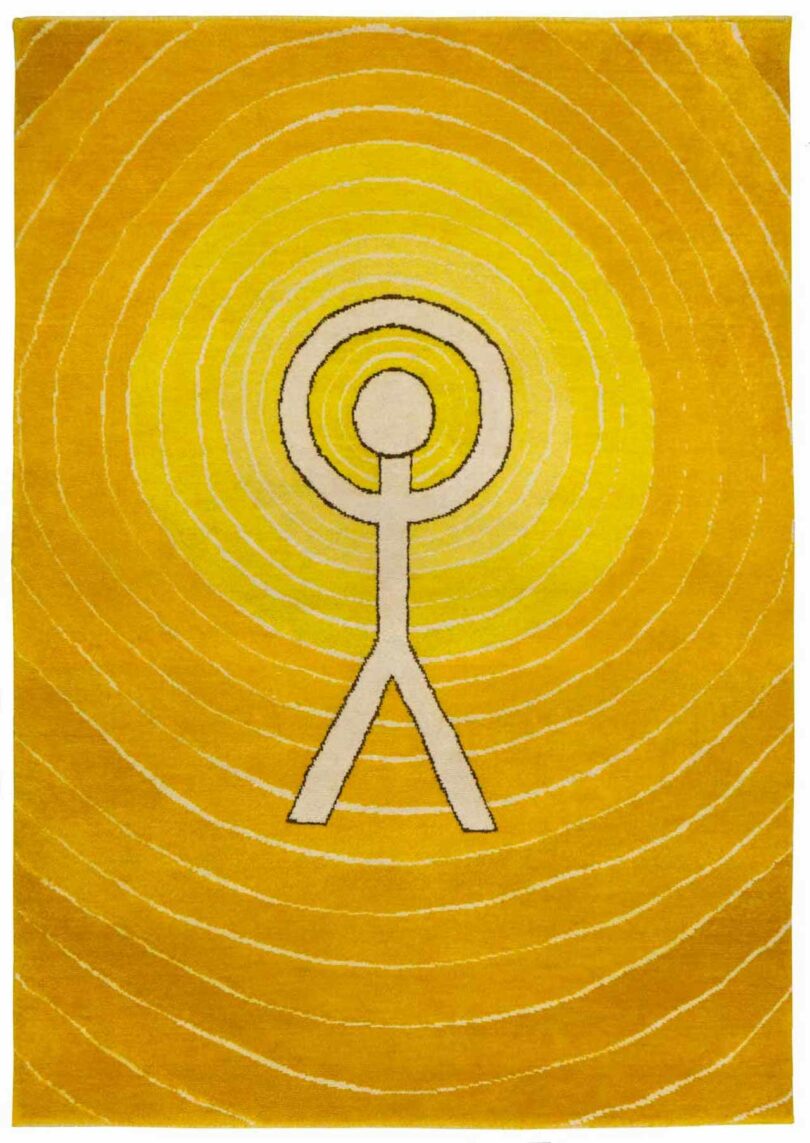yellow rug with radiating lines and a white figure