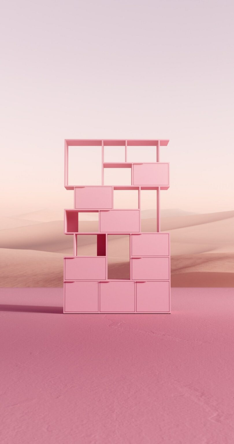 A modular pink shelf against a desert landscape at dusk.
