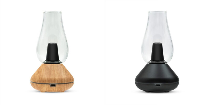 Two electric dab vaporizers that resemble vintage oil lamps, the left version finished in oak with glass top, the one on the right in black with glass top.