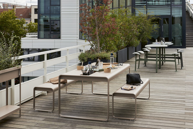Terrace with modern outdoor furniture and dining setup.