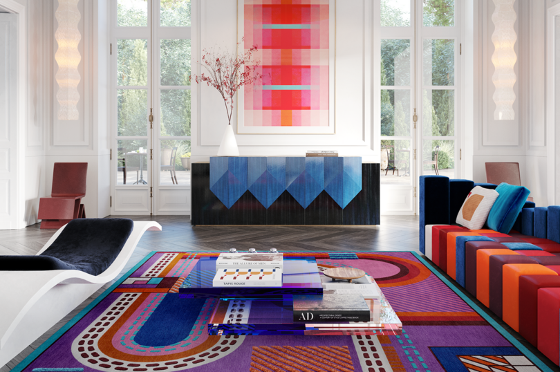 Colorful living space with a geometric pattern rug.