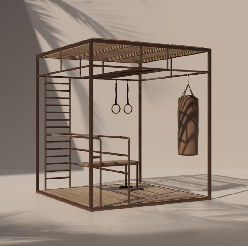 3D rendering of a multifunctional OUT-FIT outdoor gym setup with a bench, punching bag, gymnastic rings, and a ladder, all within a cube-like metal structure.