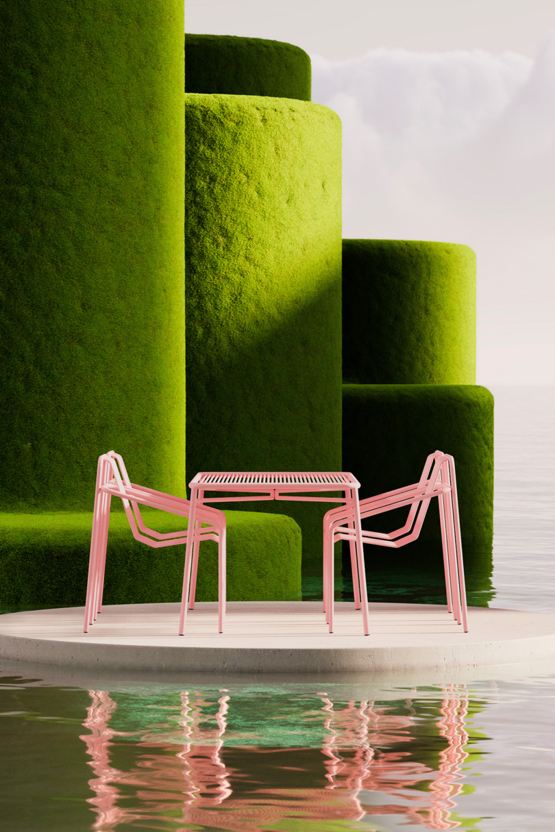 Modern pink outdoor furniture set on a circular concrete platform surrounded by water.