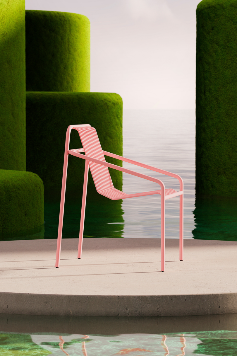 Modern pink outdoor chair on a circular concrete platform surrounded by water.