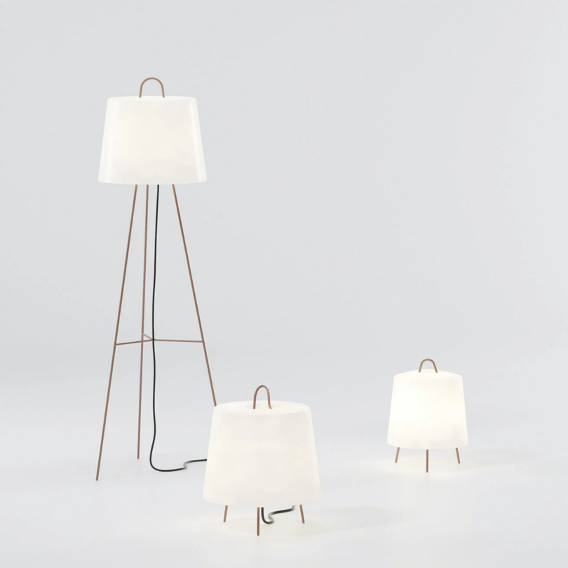 Three modern outdoor lamps varying in size and arranged in an ascending order.