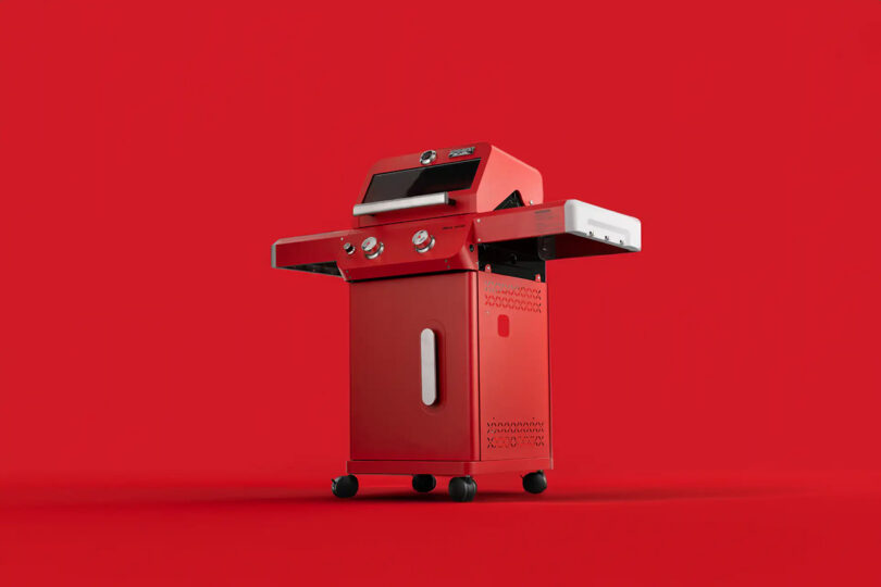 Red Monument Grills Mesa Collection barbecue grill on a plain red background.