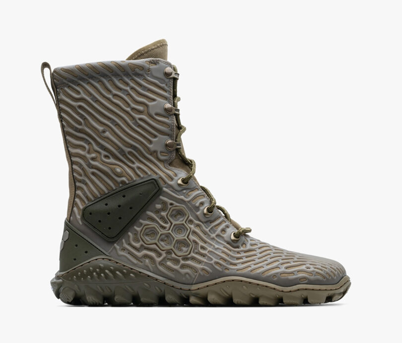 Vivobarefoot Jungle ESC boots with contoured texture pattern and rugged sole, isolated on a white background.