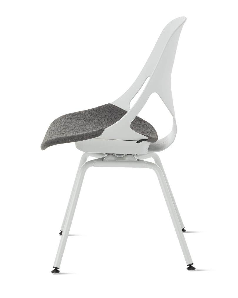 Modern office chair with a white backrest and a dark grey seat, isolated on a white background.