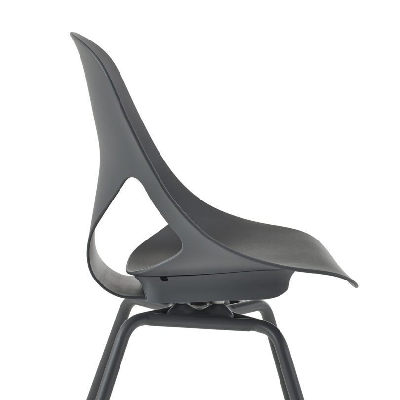 Modern dark grey chair mounted on a simple black metal frame.