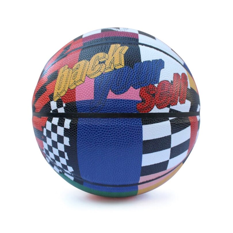 Multicolored basketball with patchwork design featuring various patterns 