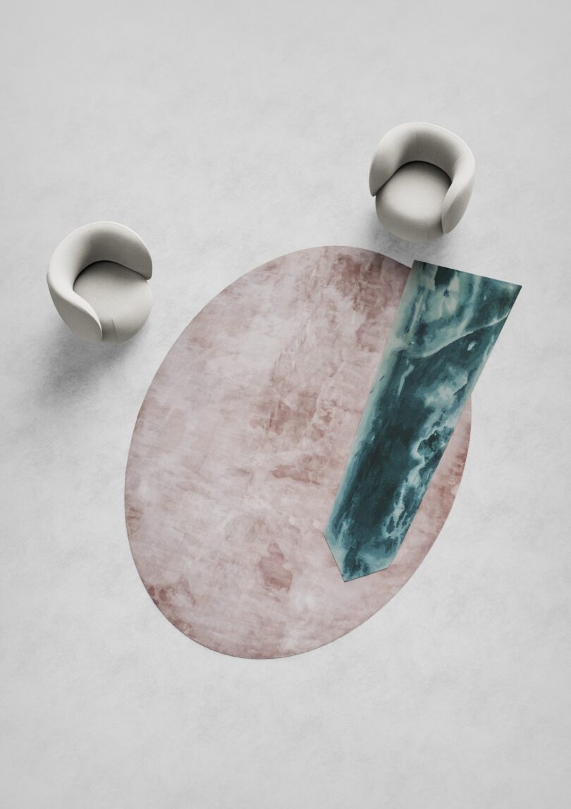 two white sculptural chair next to a rug made of a green obelisk and pink oval