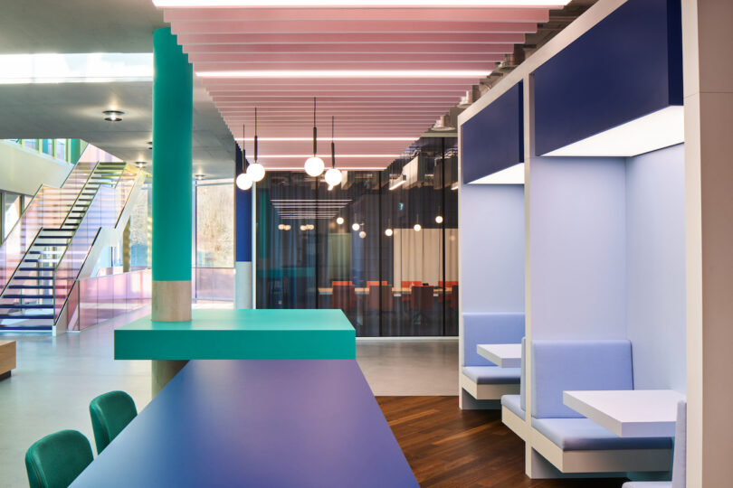 Modern office lobby with vibrant color scheme and contemporary design.