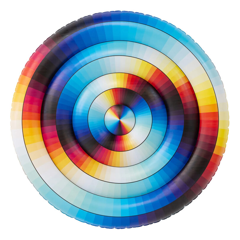 A round, inflatable pool float designed by Felipe Pantone features concentric circles in various colors, including blue, red, yellow, and black.