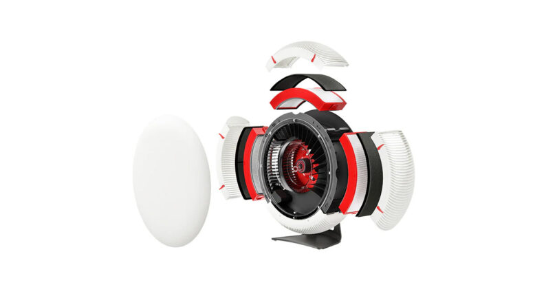 Exploded view of the IQ Air Atem X air purifier, revealing its internal components, including red and black parts, wiring, and structural elements, with a detached white cover.
