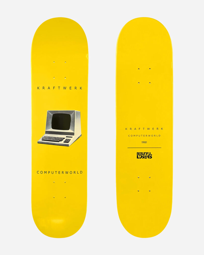 Two yellow skateboard decks from the Kraftwerk Collection. One features a computer and "Kraftwerk Computerworld" text. The other has identical text and "Beautiful Losers 1981.